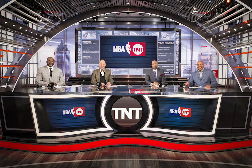 Ernie Johnson, Jr. and his co-hosts on the set of TNT’s Inside the NBA.