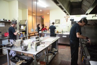 Brett's employees in the kitchen of The Cookery.