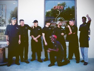 Brett with his team outside of The Cookery.