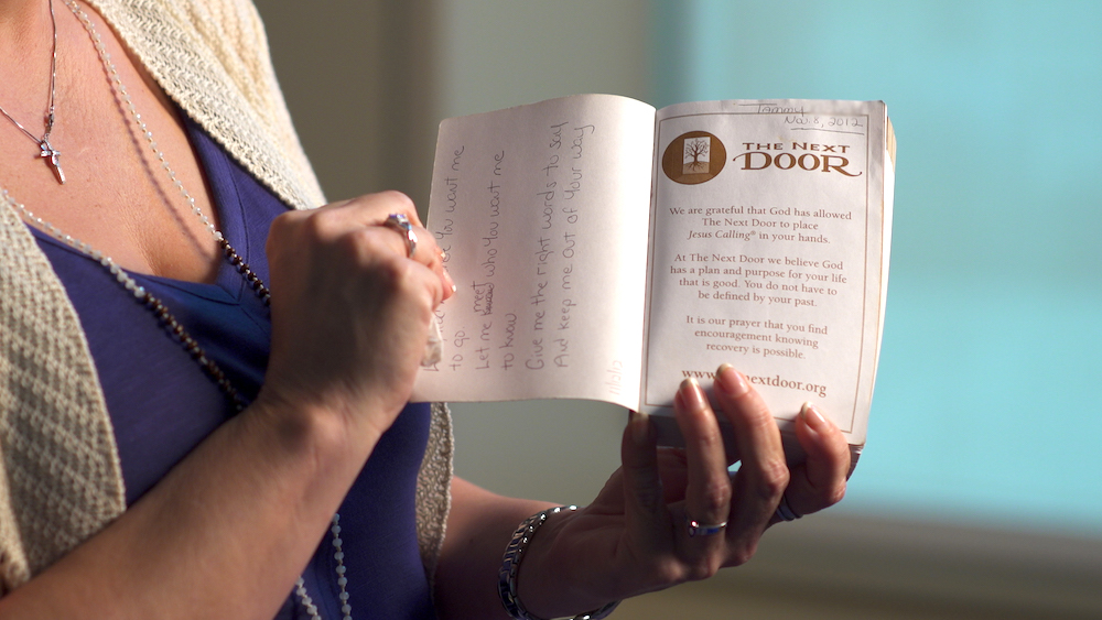 Tammy shows her worn copy of Jesus Calling.