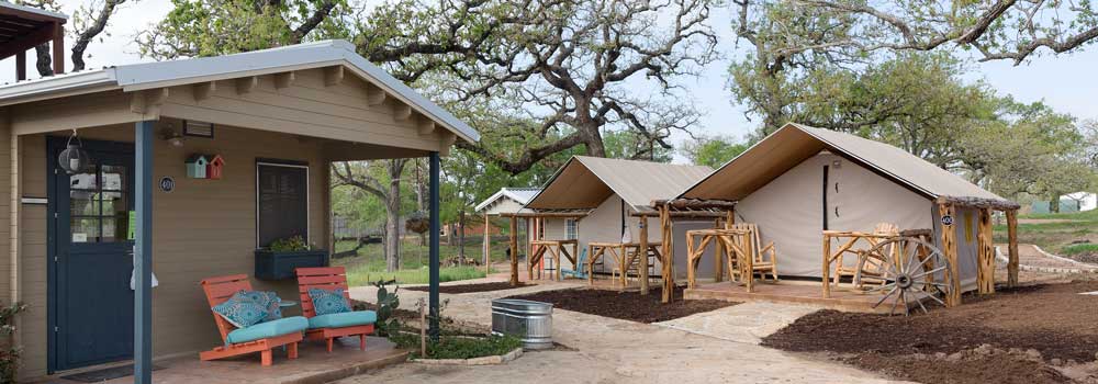 Examples of homes from the Community First! RV park, which features RVs and micro-homes for the chronically homeless in the Austin, Texas area.
