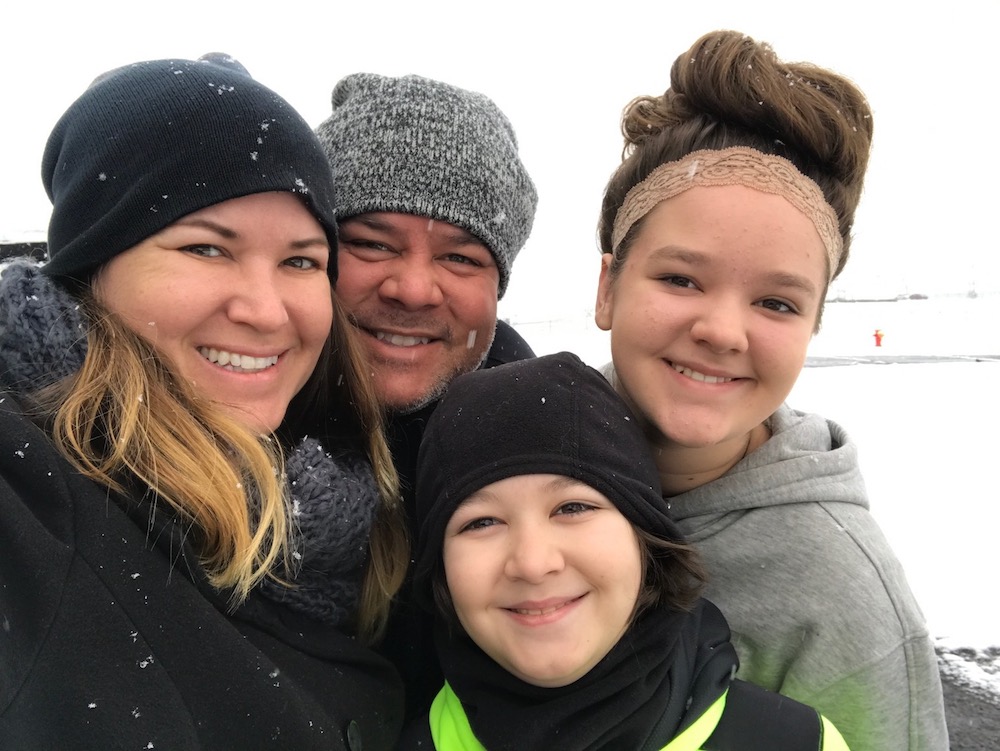 Sami Cone with her family in the winter