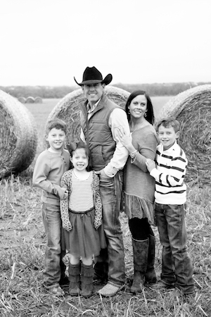 Aaron Watson with his family on a farm.