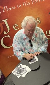 T. Graham Brown visits the Jesus Calling booth at CMA Fest 2019