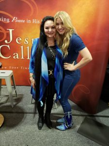 Crystal Gayle and Harper Grace meet at the Jesus Calling booth at CMA Fest 2019