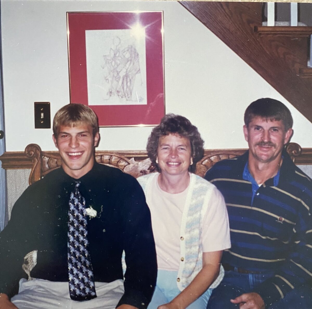 Jesus Calling podcast 406 featuring Dr. Josh Axe -shown here is a young Axe with his parents