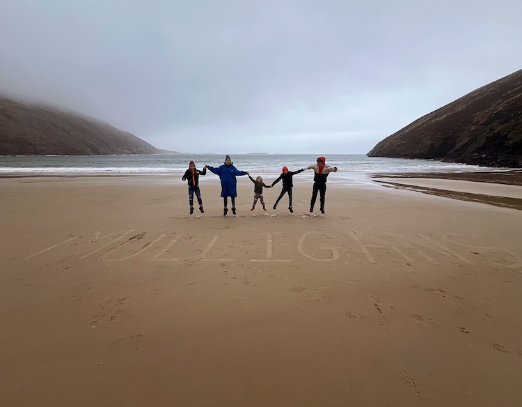 Jesus Calling podcast 416 featuring Darren Mulligan and Joseph Habedank - The Mulligan Family shown along the beach - #1 PC Courtesy of We Are Messengers and Curb Records