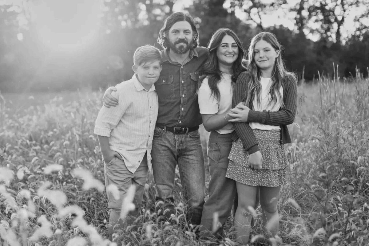 Jesus Calling podcast 427 featuring Josh Baldwin and Diane Chew - shown here is Baldwin with his family