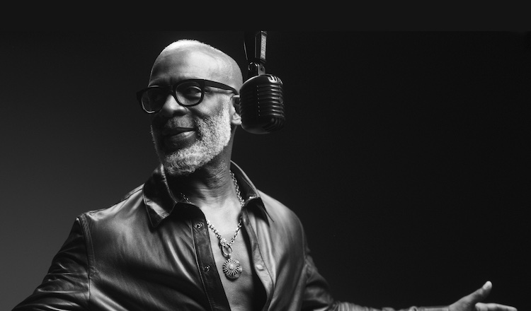 Jesus Calling podcast 440 featuring BeBe Winans - black & white image with microphone