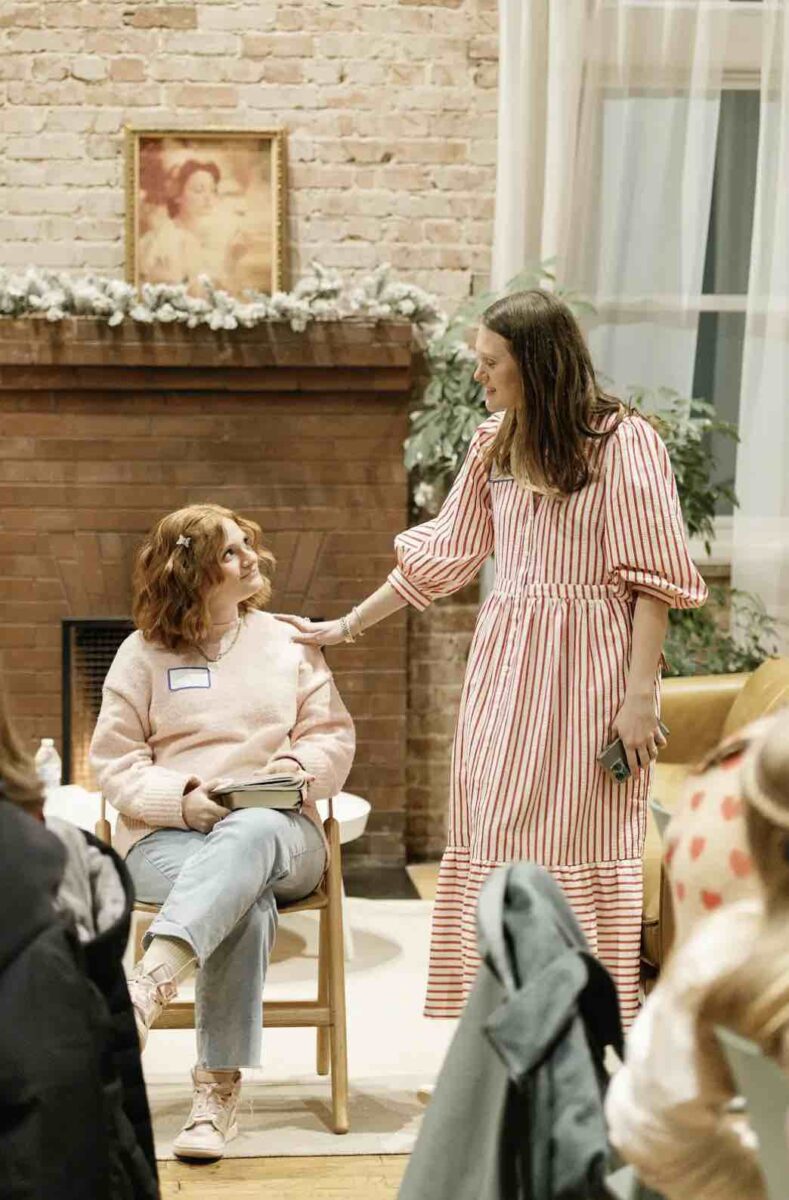 Jesus Calling podcast 458 featuring Hope Reagan Harris - Purpose Doesn't Pause - shown here talking to a young woman