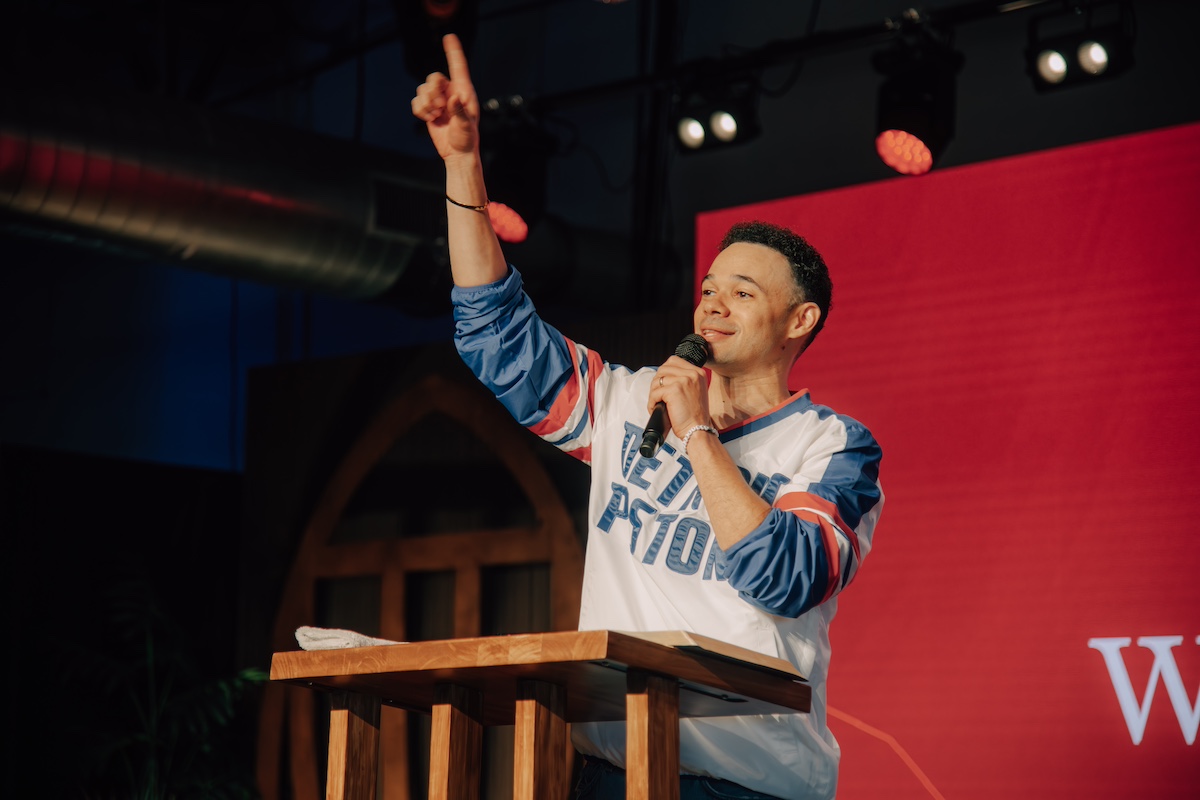 Jesus Calling podcast 461 featuring Tauren Wells - shown speaking from podium - Photo Feb 09 2025, 1 35 04 PM PC Amber Fletcher