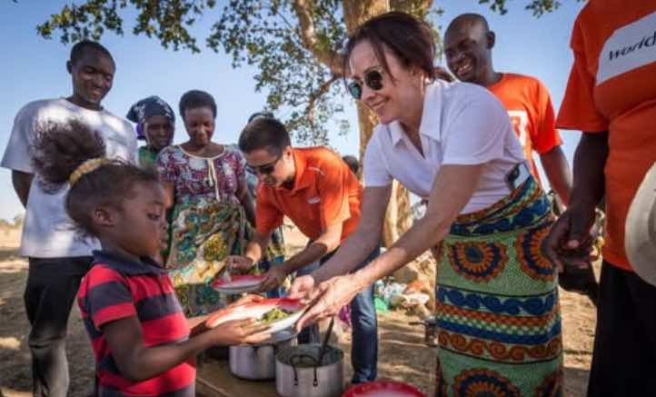 Jesus Calling podcast 473 - Lights, Camera, Hope featuring Patricia Heaton on Persevering Through Adversity - feeding children