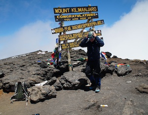 Jesus Calling 476 podcast featuring JT Mestdagh - shown here JT on Mount Kilamanjaro