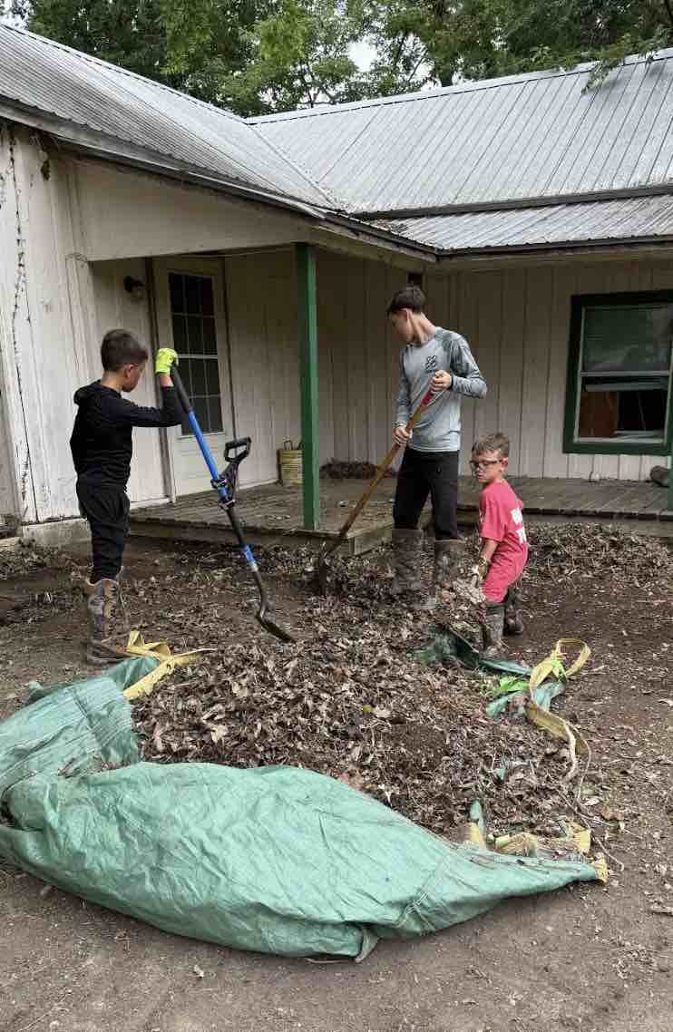 Jesus Calling podcast 478 featuring Justin Knoop with Blessing Boys - shown here on location cleaning a yard