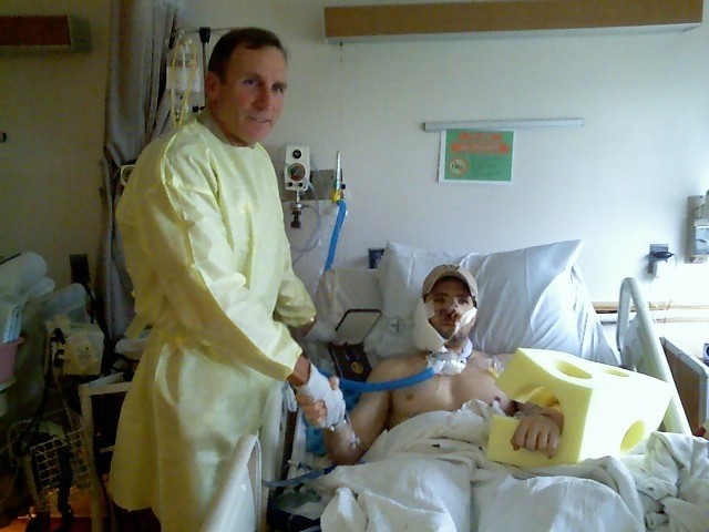 Jesus Calling podcast 485 featuring Jason and Erica Redman - Jason hown here in hospital bed after war injury - 19 PC Courtesy of Jason Redman